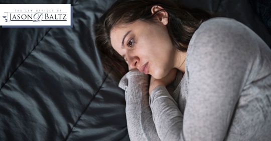 Upset woman laying down